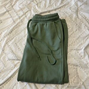 Lightly worn women’s green fabletics cotton sweatpants.